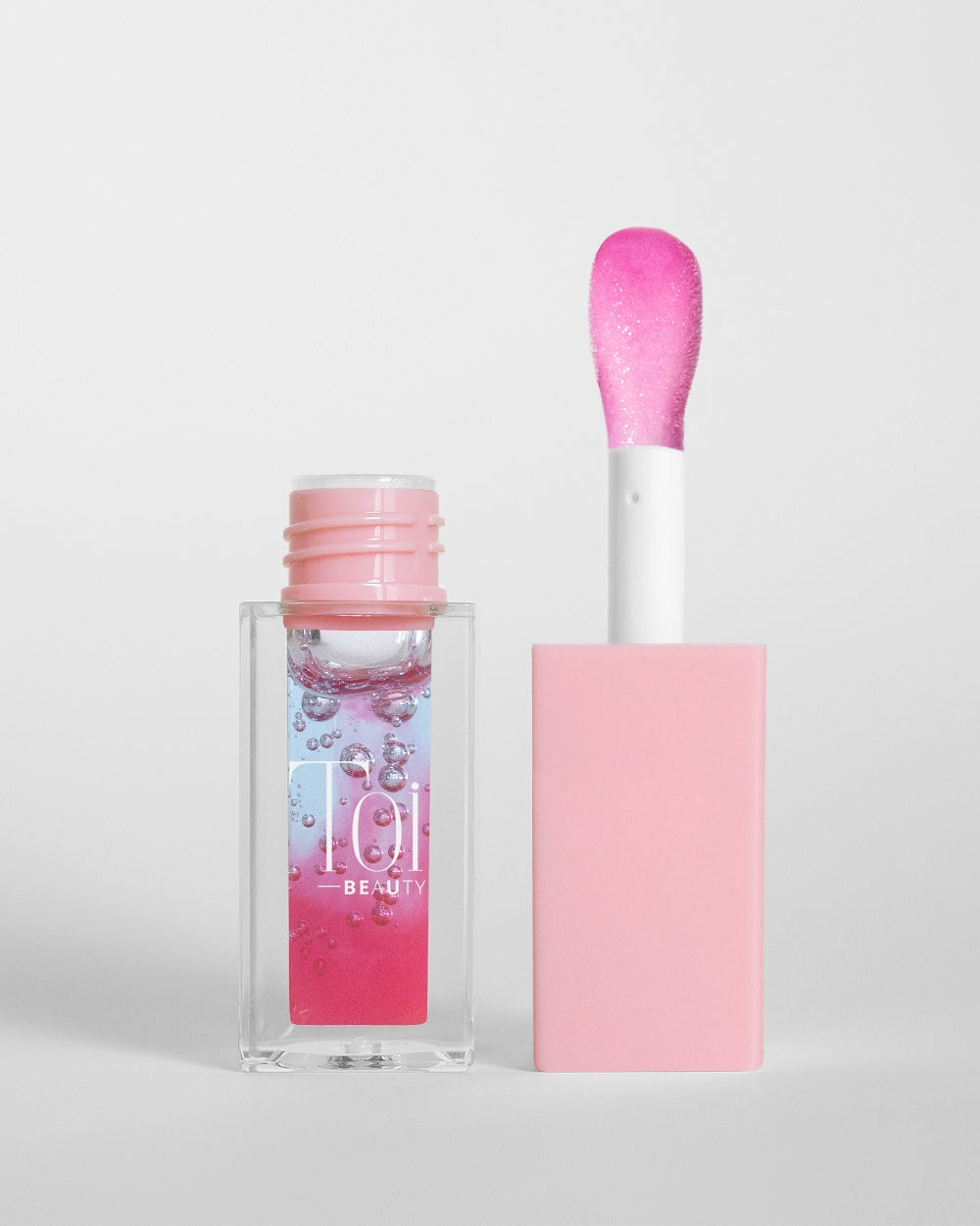 Tinted lip oil in clear packaging for everyday wear. Color Mint Berry